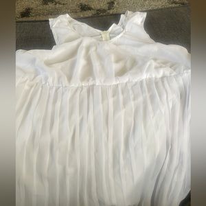 Sleeveless white jumpsuit